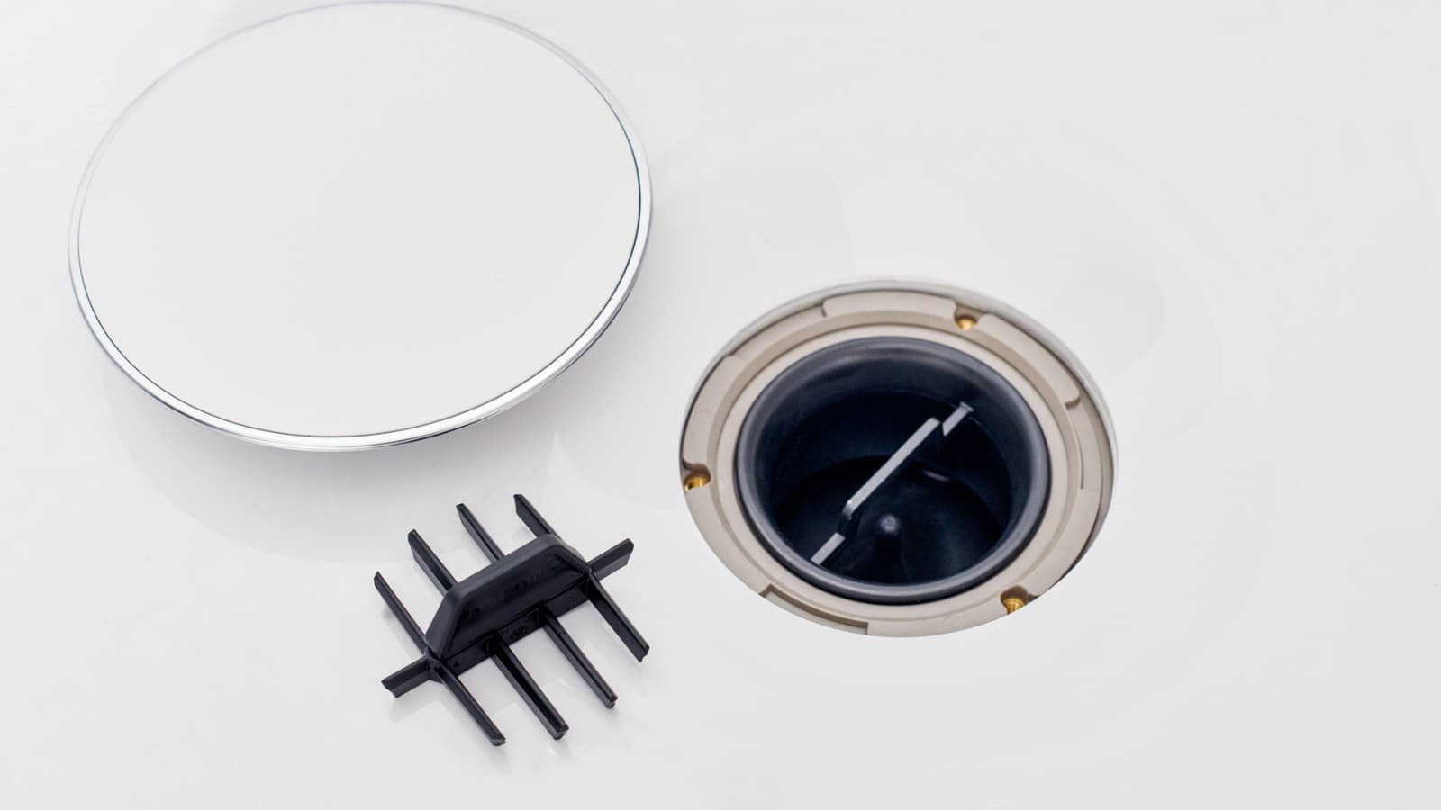 Vložek v obliki glavnika v odtoku Vložek v obliki glavnika v odtoku