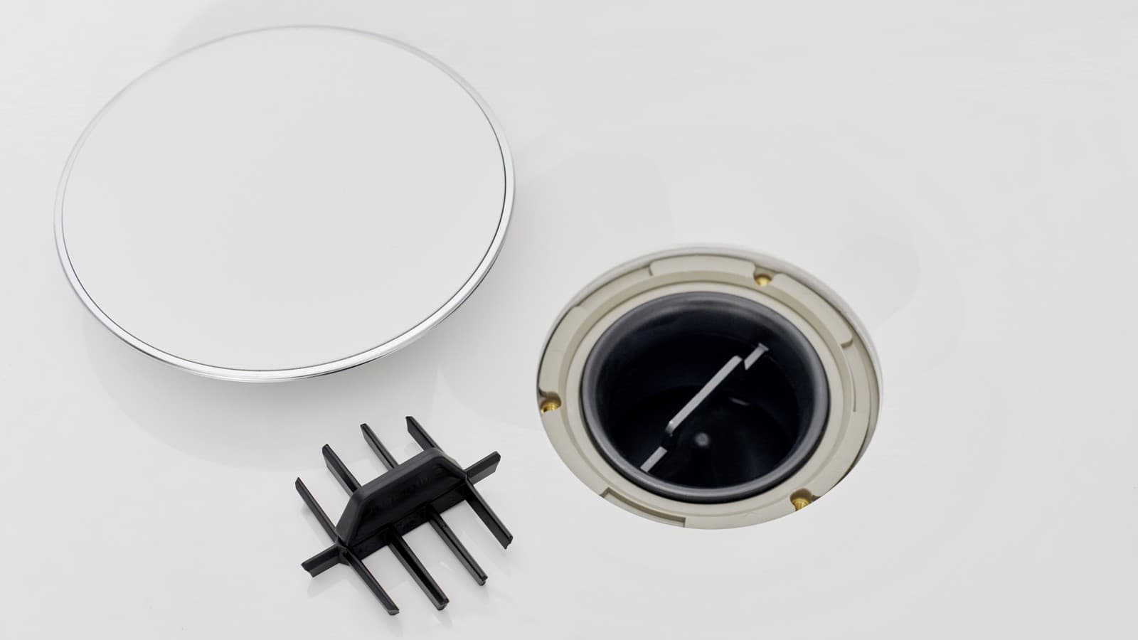 Pokrov odtoka in nastavek z glavnikom Pokrov odtoka in nastavek z glavnikom